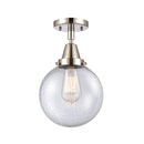 Beacon Flush Mount shown in the Polished Nickel finish with a Seedy shade