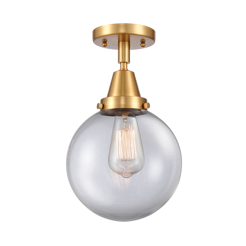 Beacon Flush Mount shown in the Satin Gold finish with a Clear shade