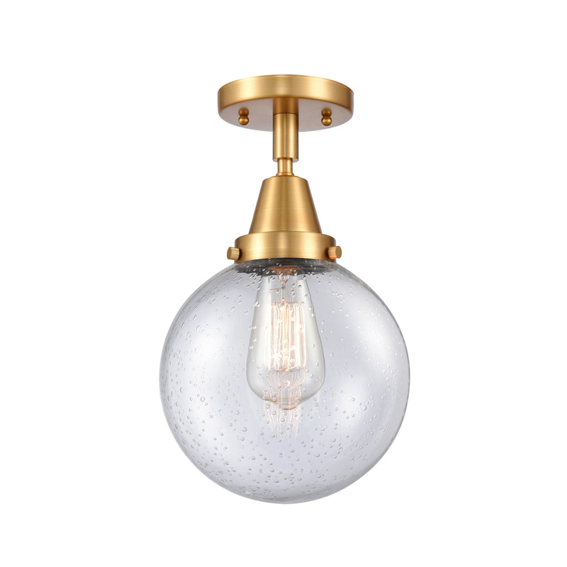 Beacon Flush Mount shown in the Satin Gold finish with a Seedy shade