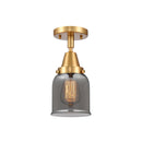 Bell Flush Mount shown in the Satin Gold finish with a Plated Smoke shade