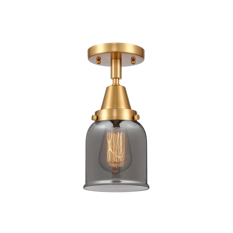 Bell Flush Mount shown in the Satin Gold finish with a Plated Smoke shade