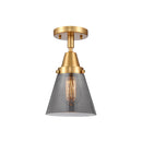 Cone Flush Mount shown in the Satin Gold finish with a Plated Smoke shade