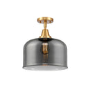 Bell Flush Mount shown in the Satin Gold finish with a Plated Smoke shade