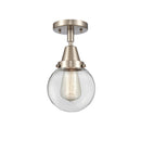 Beacon Flush Mount shown in the Brushed Satin Nickel finish with a Clear shade