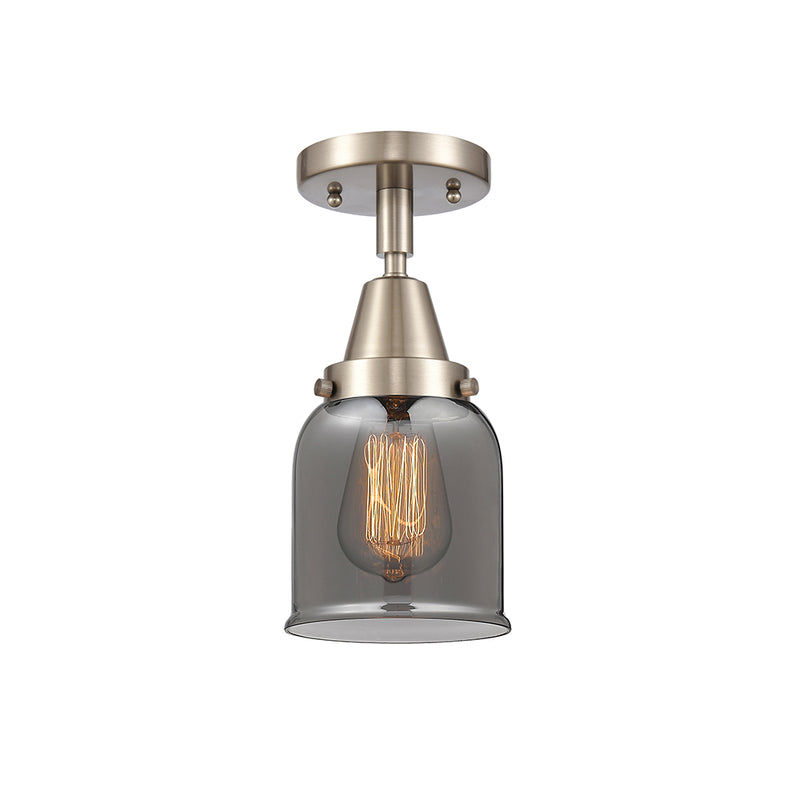 Bell Flush Mount shown in the Brushed Satin Nickel finish with a Plated Smoke shade