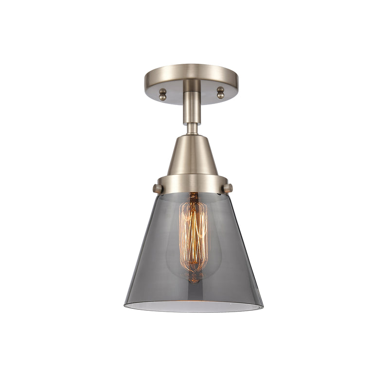 Cone Flush Mount shown in the Brushed Satin Nickel finish with a Plated Smoke shade