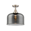 Bell Flush Mount shown in the Brushed Satin Nickel finish with a Plated Smoke shade