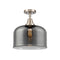 Bell Flush Mount shown in the Brushed Satin Nickel finish with a Plated Smoke shade