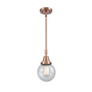 Beacon Mini Pendant shown in the Antique Copper finish with a Seedy shade