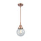 Beacon Mini Pendant shown in the Antique Copper finish with a Seedy shade