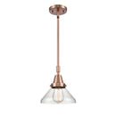 Caden Mini Pendant shown in the Antique Copper finish with a Clear shade