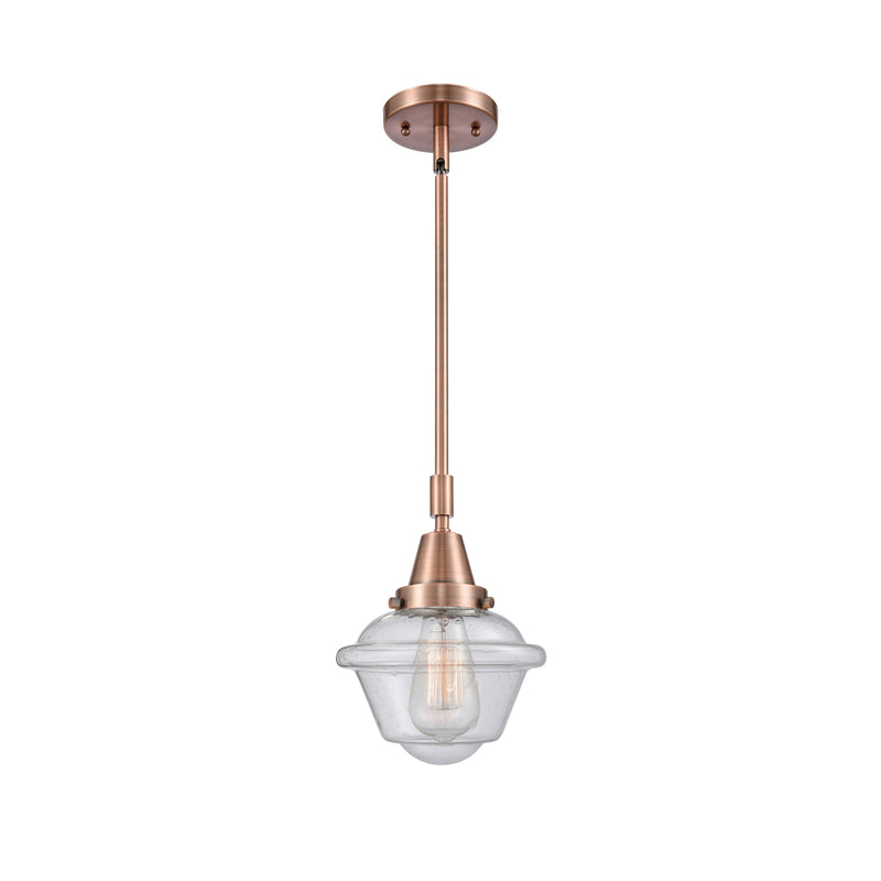 Oxford Mini Pendant shown in the Antique Copper finish with a Seedy shade