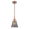 Cone Mini Pendant shown in the Antique Copper finish with a Plated Smoke shade