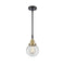 Beacon Mini Pendant shown in the Black Antique Brass finish with a Clear shade