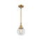 Beacon Mini Pendant shown in the Brushed Brass finish with a Clear shade