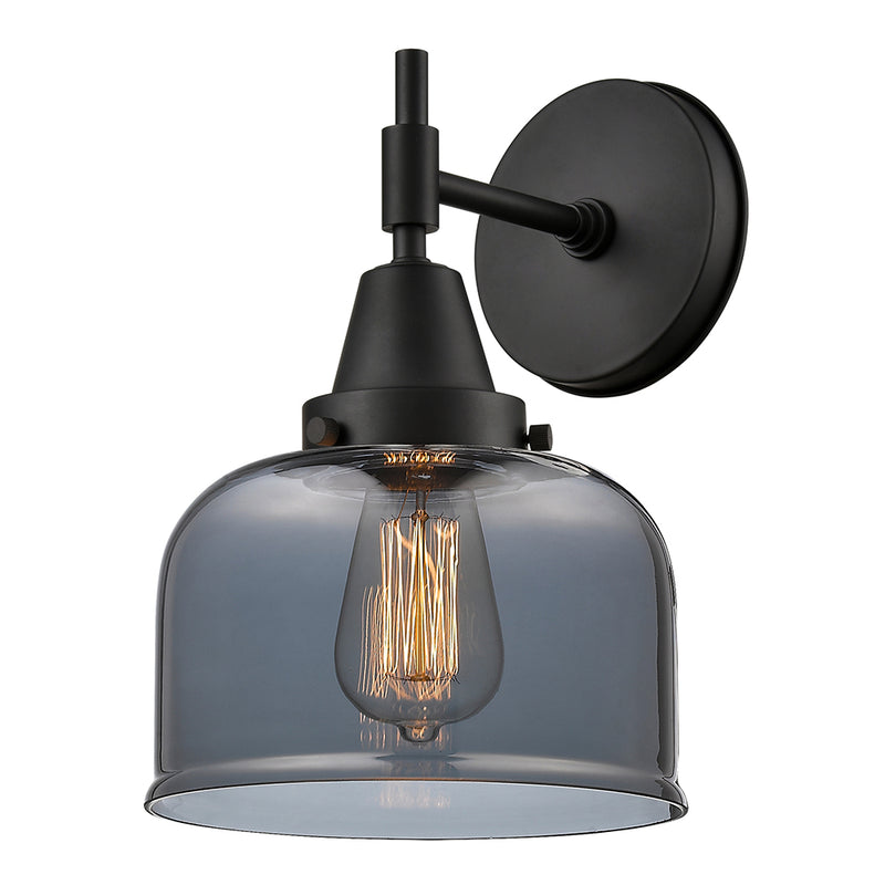 Caden Sconce shown in the Matte Black finish with a Plated Smoke shade