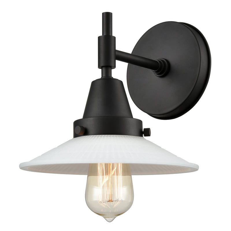 Caden Sconce shown in the Matte Black finish with a Matte White Halophane shade