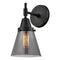 Caden Sconce shown in the Matte Black finish with a Plated Smoke shade