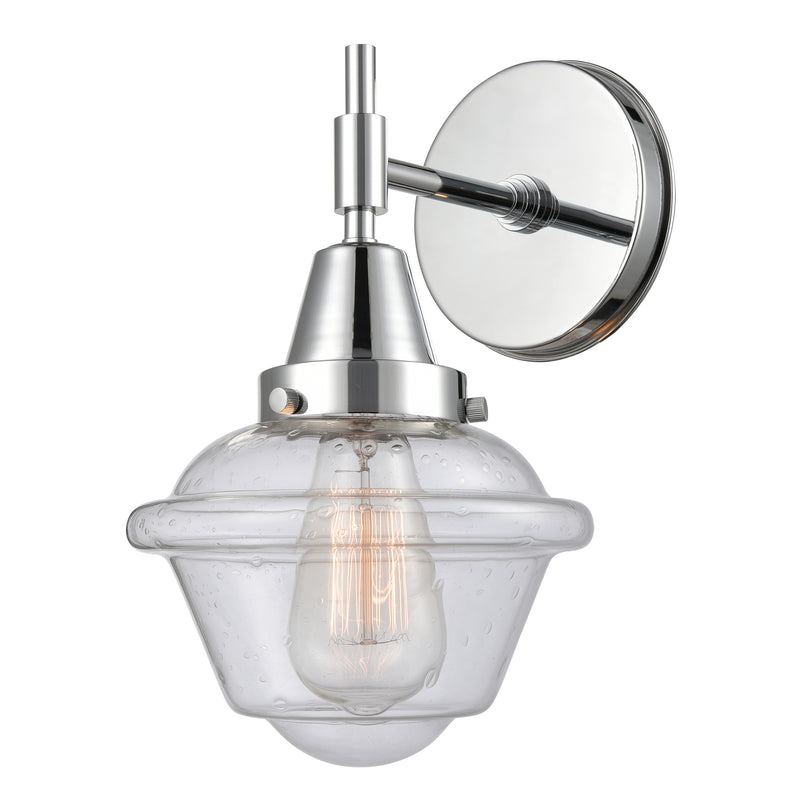 Caden Sconce shown in the Polished Chrome finish with a Seedy shade