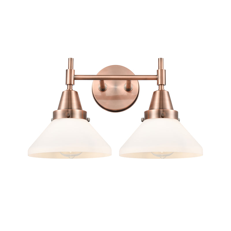 Caden Bath Vanity Light shown in the Antique Copper finish with a Matte White shade