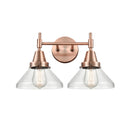 Caden Bath Vanity Light shown in the Antique Copper finish with a Seedy shade