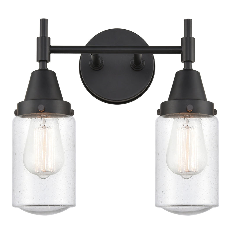 Caden Bath Vanity Light shown in the Matte Black finish with a Seedy shade