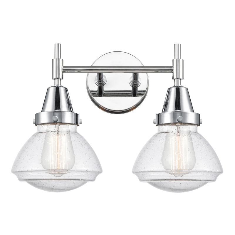 Caden Bath Vanity Light shown in the Polished Chrome finish with a Seedy shade