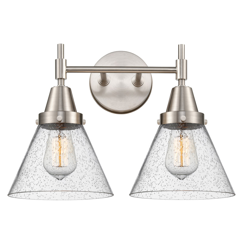 Caden Bath Vanity Light shown in the Satin Nickel finish with a Seedy shade