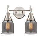 Caden Bath Vanity Light shown in the Satin Nickel finish with a Plated Smoke shade