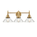 Caden Bath Vanity Light shown in the Brushed Brass finish with a Seedy shade