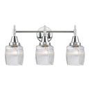 Caden Bath Vanity Light shown in the Polished Chrome finish with a Clear Halophane shade