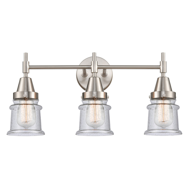 Caden Bath Vanity Light shown in the Satin Nickel finish with a Seedy shade