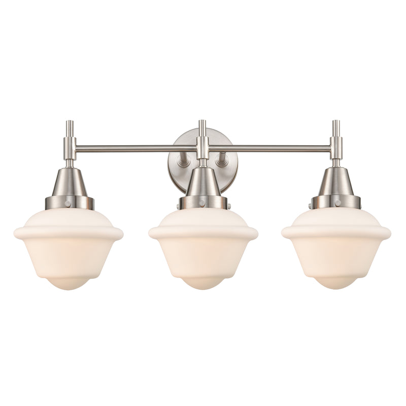 Caden Bath Vanity Light shown in the Satin Nickel finish with a Matte White shade