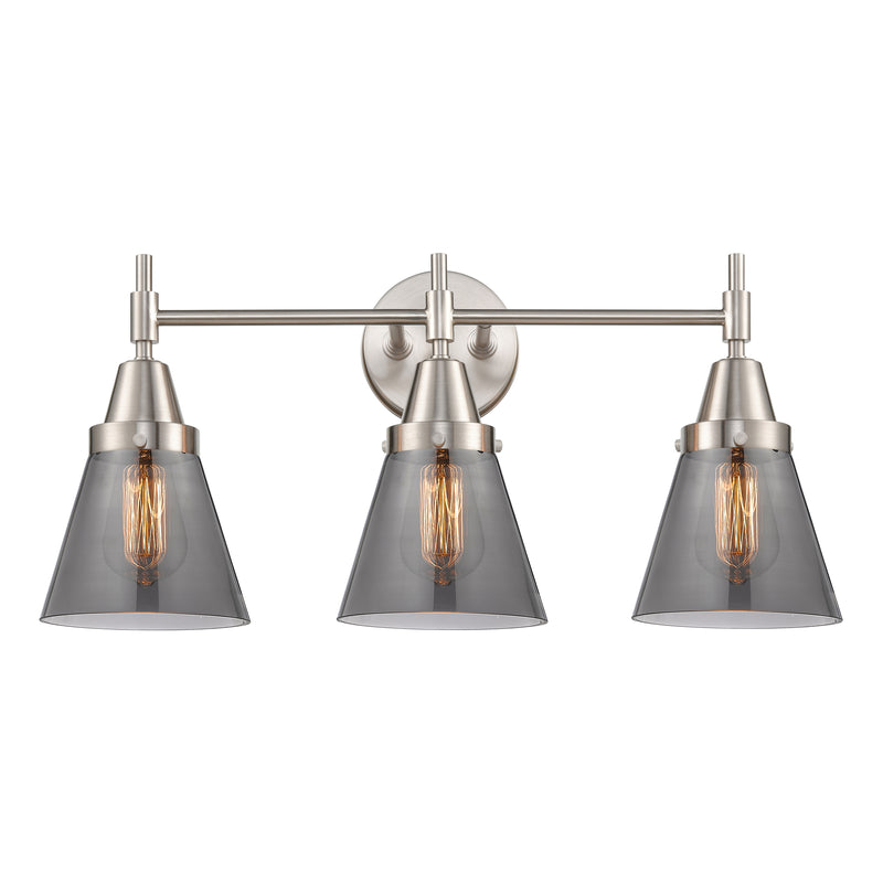 Caden Bath Vanity Light shown in the Satin Nickel finish with a Plated Smoke shade