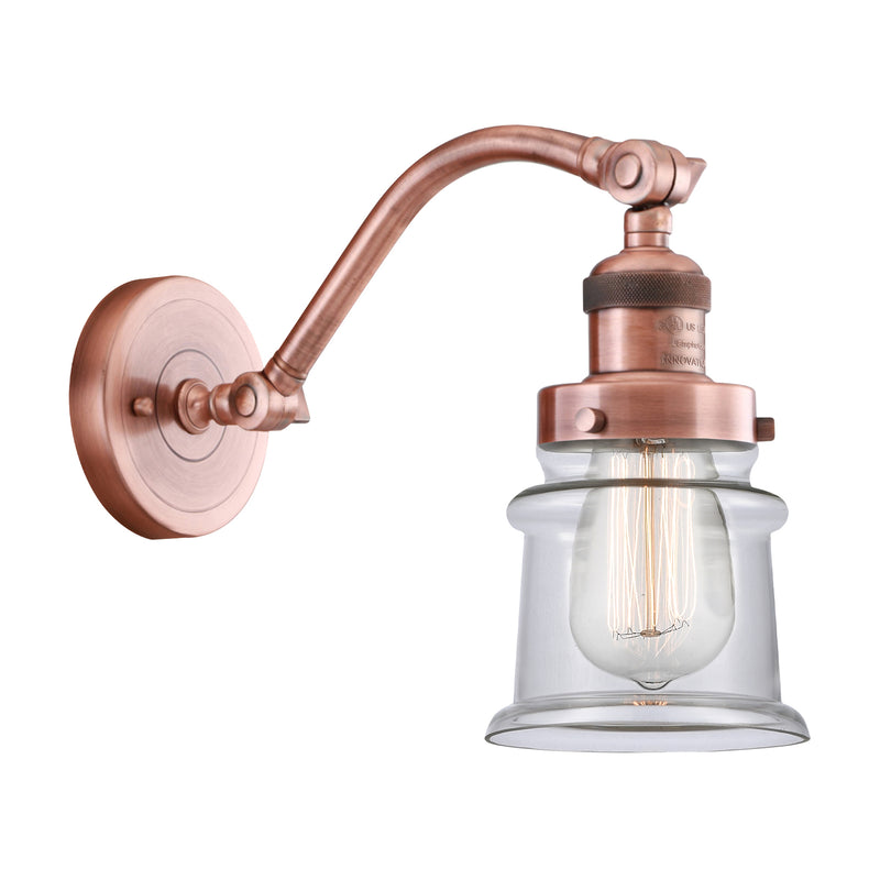 Canton Sconce shown in the Antique Copper finish with a Clear shade