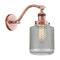 Stanton Sconce shown in the Antique Copper finish with a Clear Wire Mesh shade