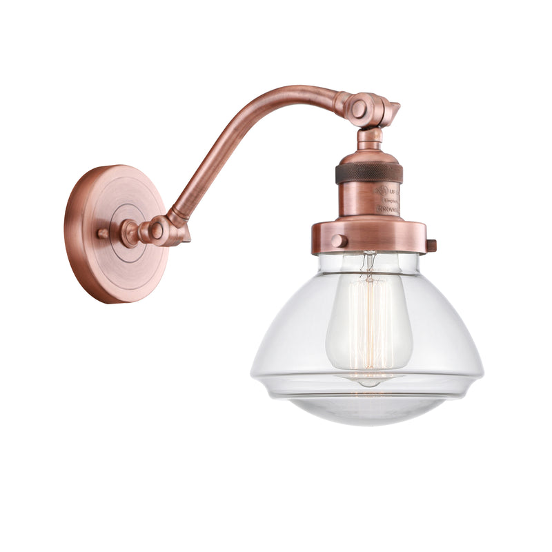 Olean Sconce shown in the Antique Copper finish with a Clear shade