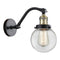 Beacon Sconce shown in the Black Antique Brass finish with a Clear shade