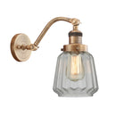 Chatham Sconce shown in the Brushed Brass finish with a Clear shade