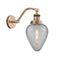 Geneseo Sconce shown in the Brushed Brass finish with a Clear Crackled shade