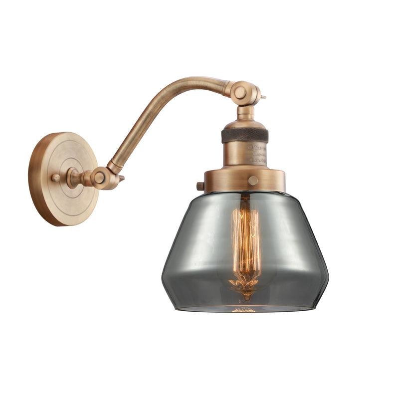 Fulton Sconce shown in the Brushed Brass finish with a Plated Smoke shade