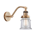 Canton Sconce shown in the Brushed Brass finish with a Clear shade