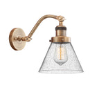 Cone Sconce shown in the Brushed Brass finish with a Seedy shade