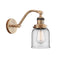 Bell Sconce shown in the Brushed Brass finish with a Clear shade