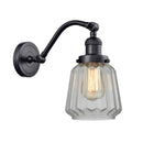 Chatham Sconce shown in the Matte Black finish with a Clear shade