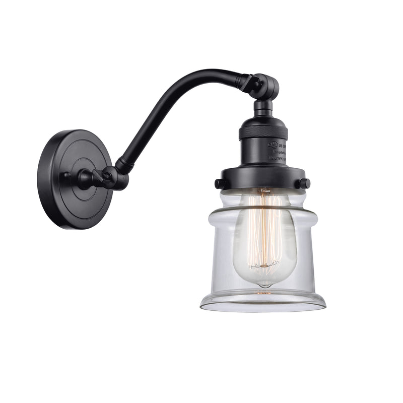 Canton Sconce shown in the Matte Black finish with a Clear shade