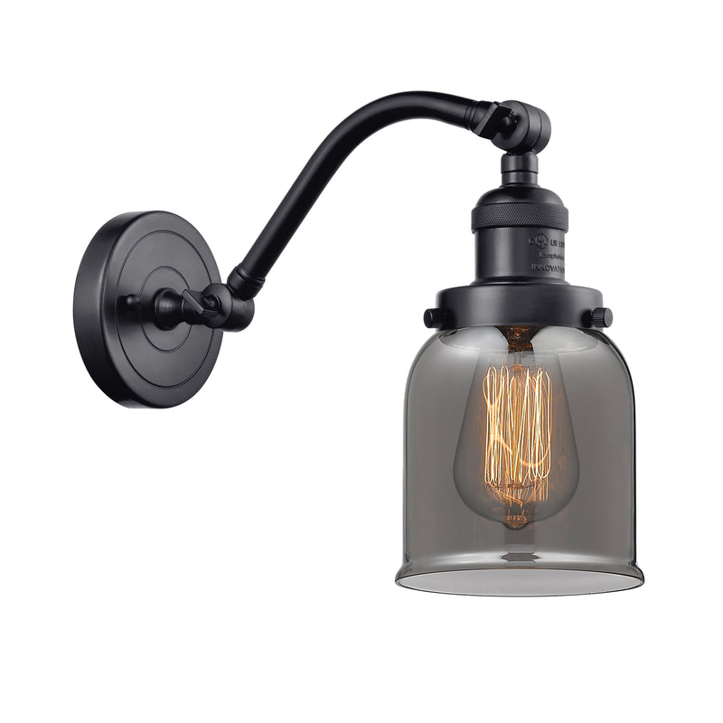 Bell Sconce shown in the Matte Black finish with a Plated Smoke shade