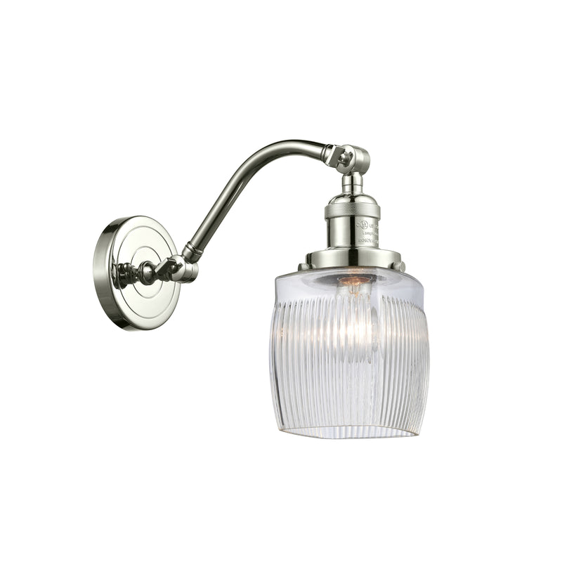 Colton Sconce shown in the Polished Nickel finish with a Clear Halophane shade