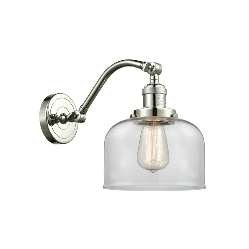 Bell Sconce shown in the Polished Nickel finish with a Clear shade