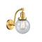 Beacon Sconce shown in the Satin Gold finish with a Seedy shade